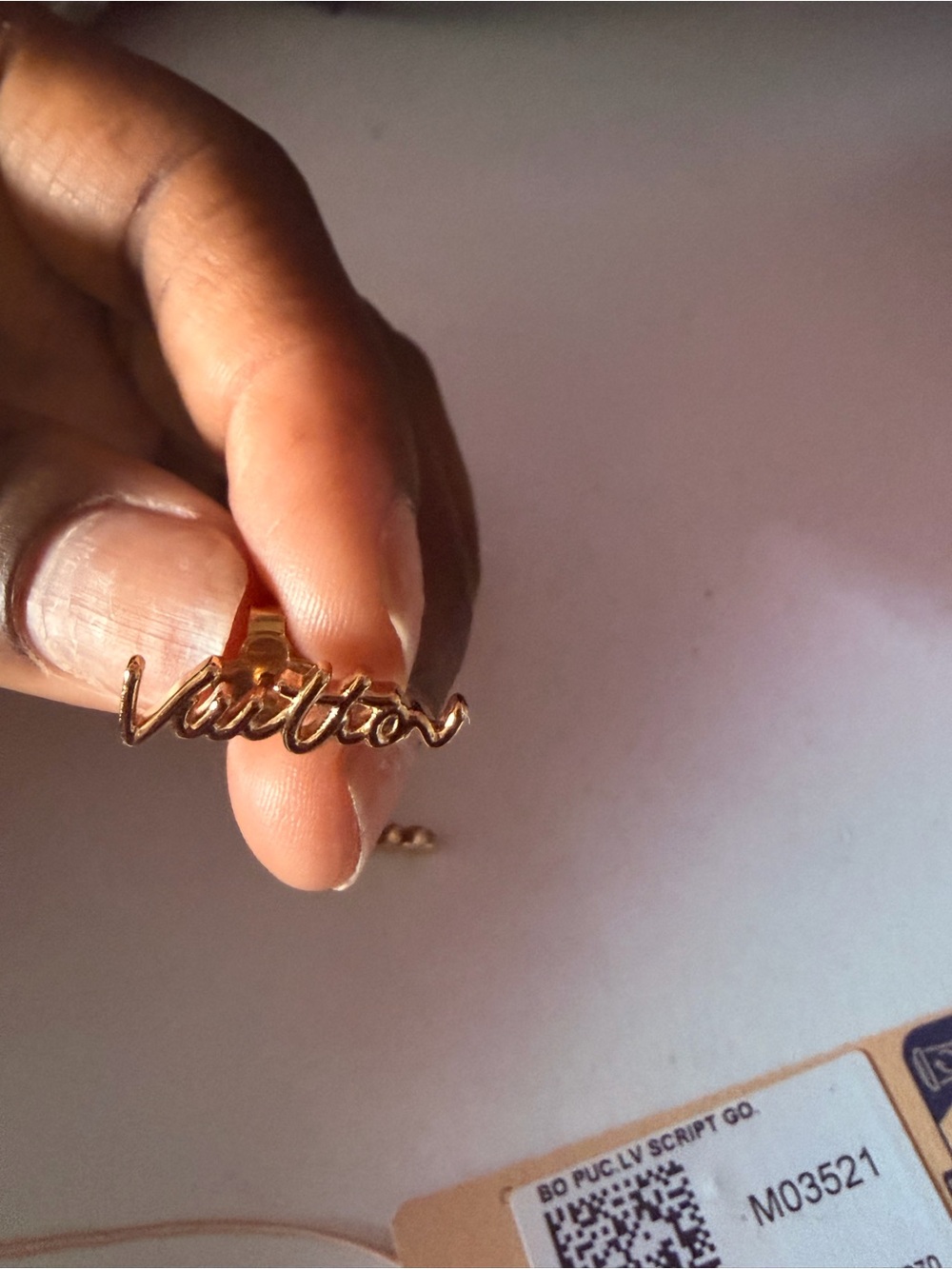 Louis Vuitton Gold Script Logo Stud Earrings